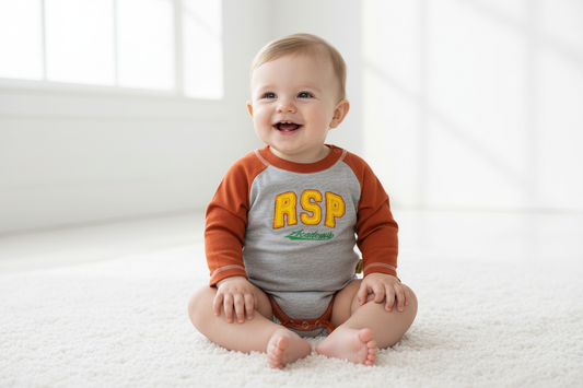 Baby boy 9 months wearing bodysuit