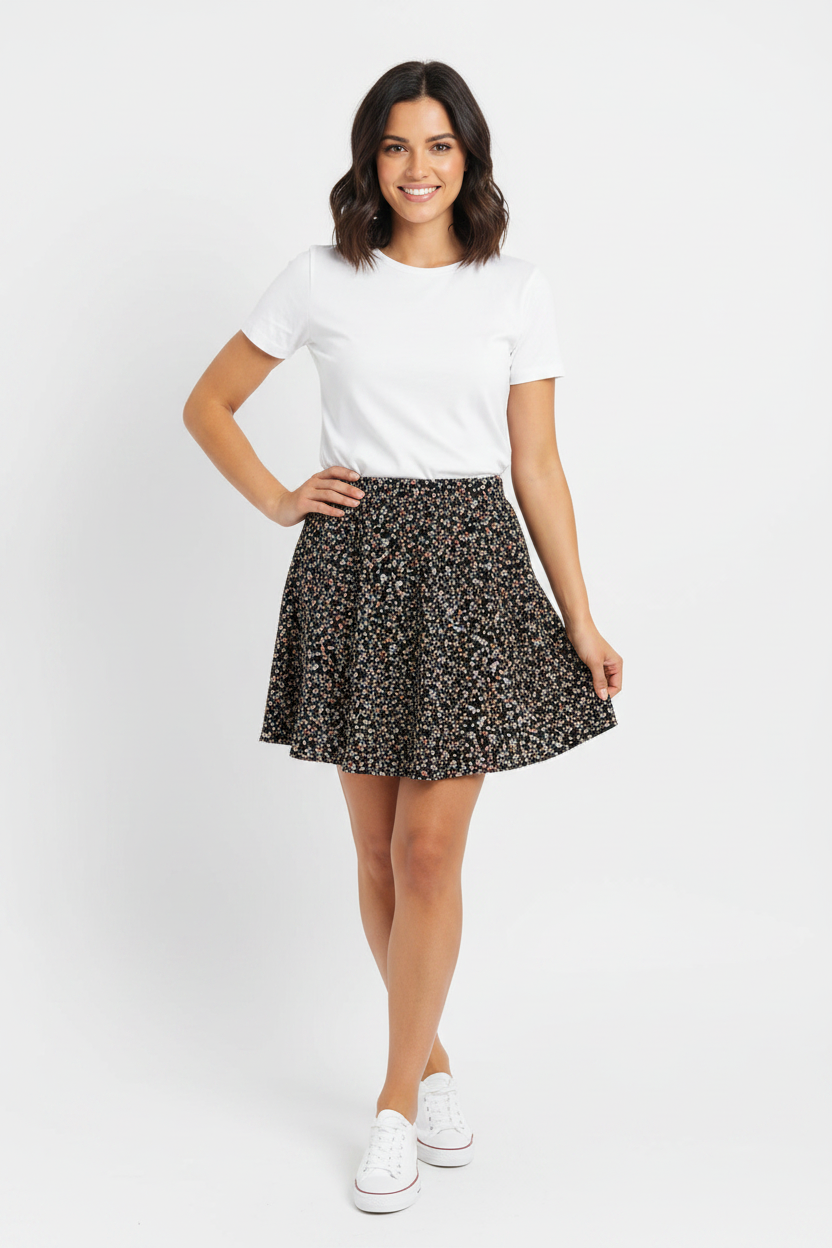 Model wearing black floral mini skater skirt