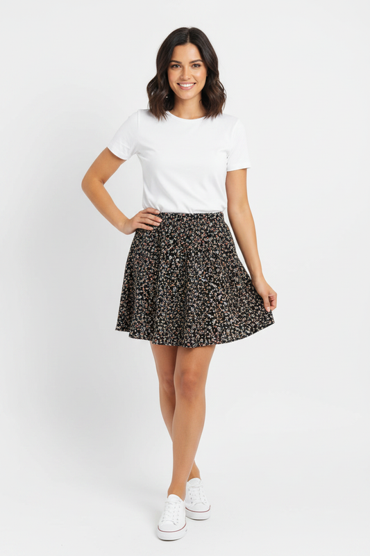 Model wearing black floral mini skater skirt