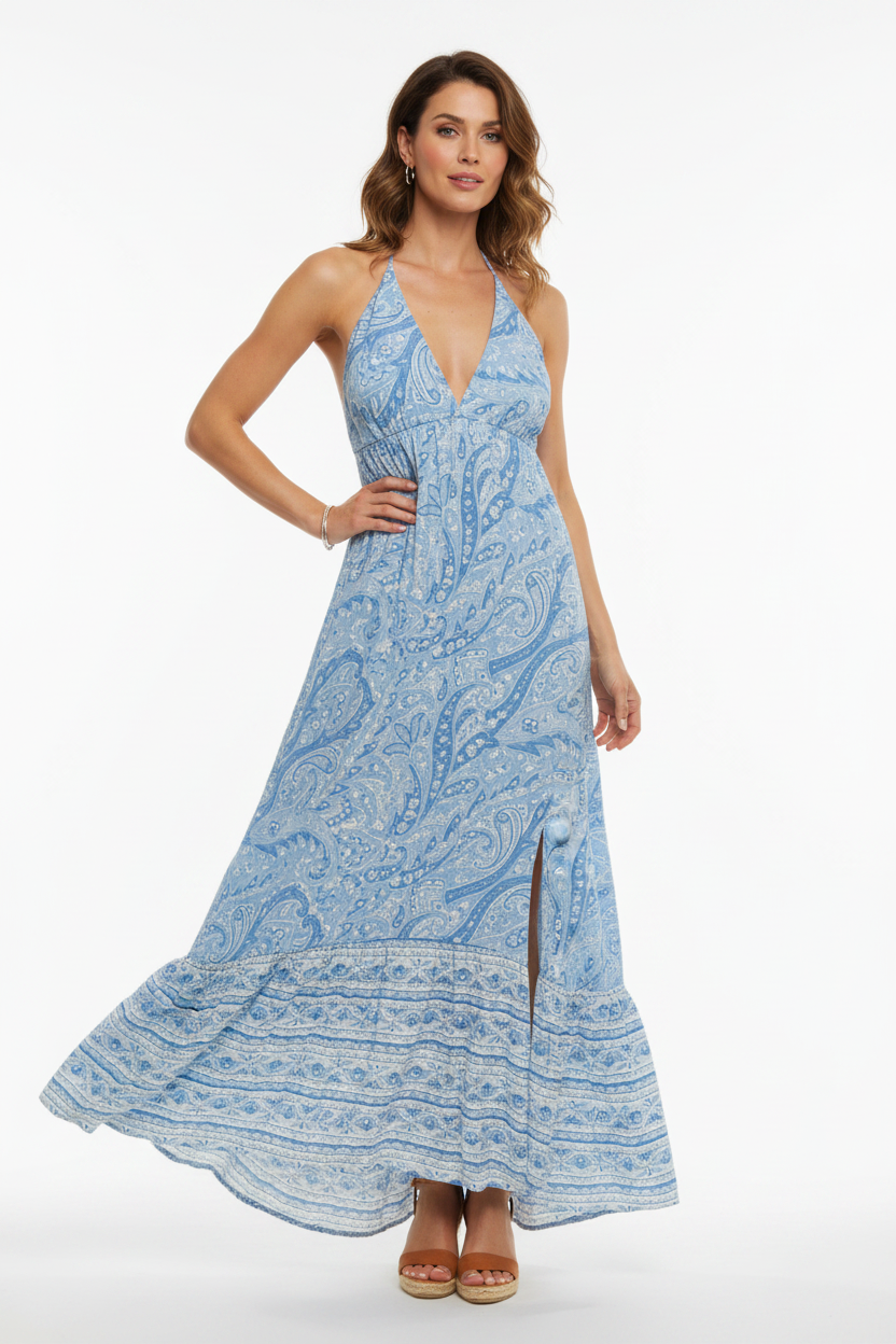 Model wearing blue paisley halter maxi dress