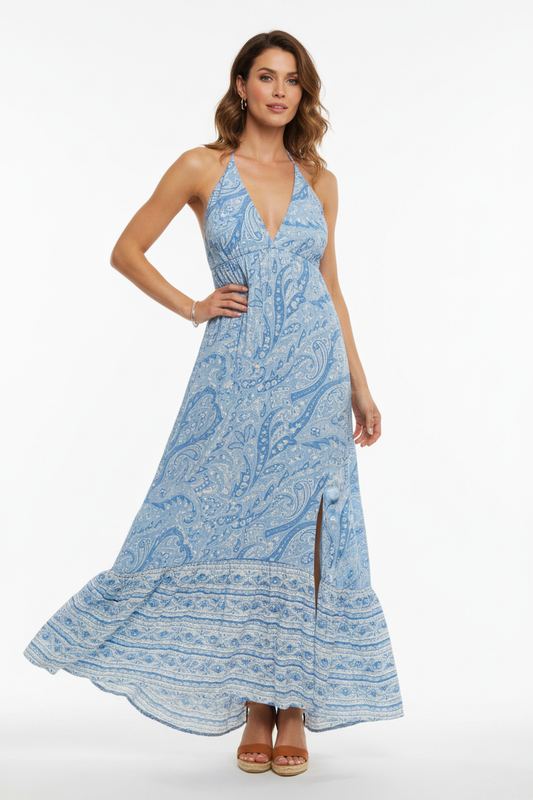 Model wearing blue paisley halter maxi dress