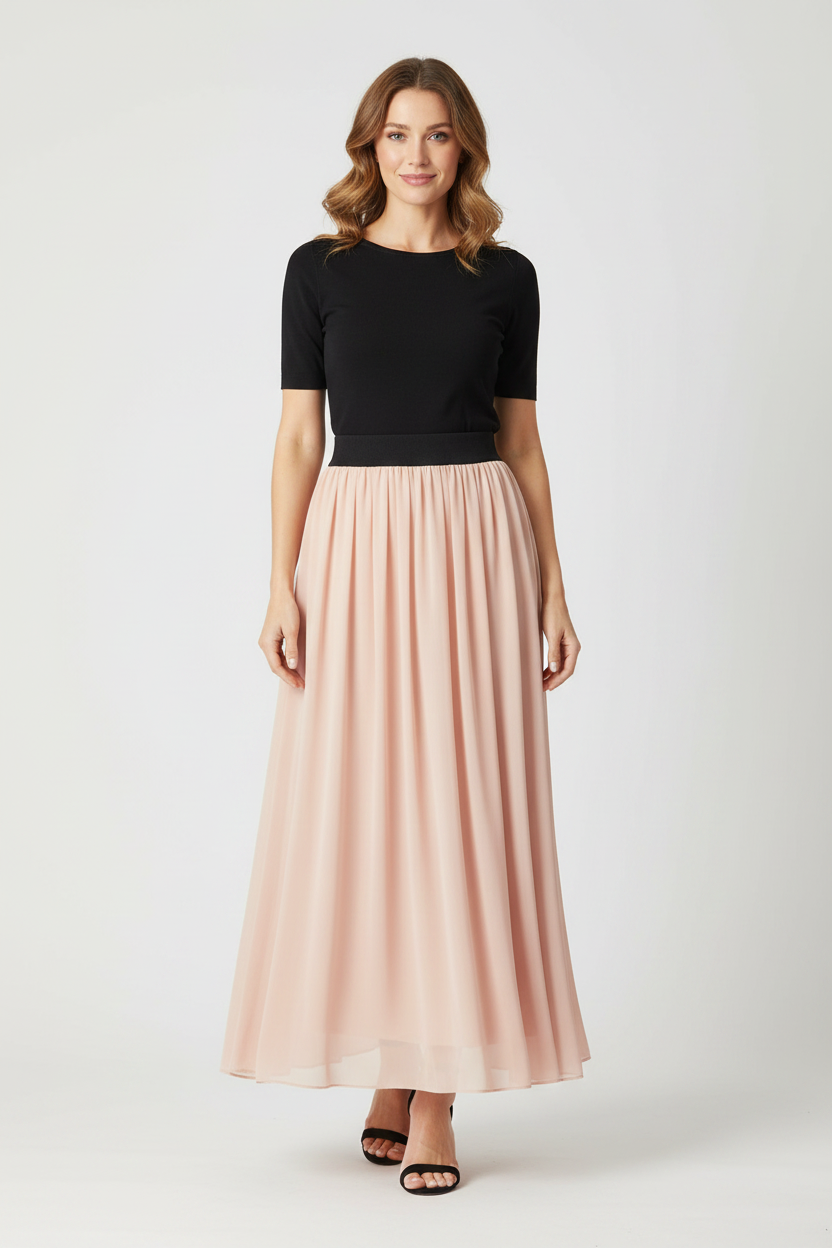Model wearing blush pink chiffon maxi skirt