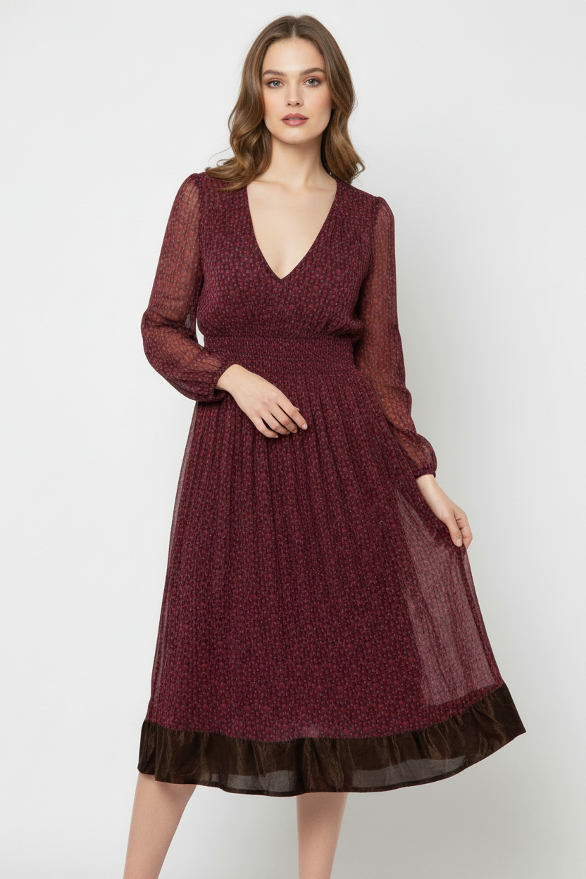 Model wearing burgundy V-neck midi dress with velvet hem