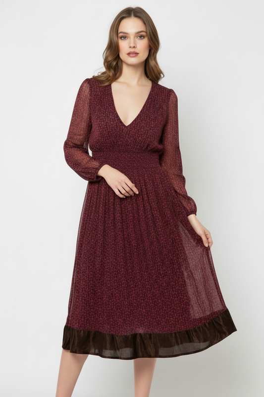 Model wearing burgundy V-neck midi dress with velvet hem
