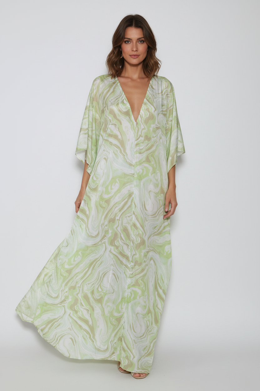 Model wearing green marble print kaftan maxi dress