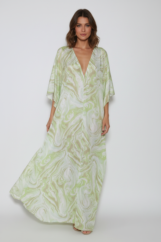 Model wearing green marble print kaftan maxi dress